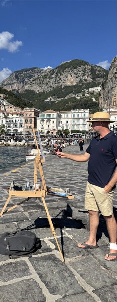 Painting on the harbour at Amalfi, Italy